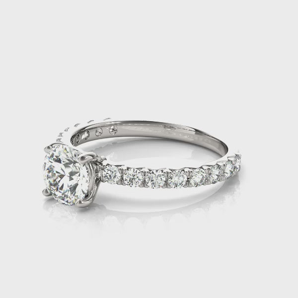 Round Diamond Side Stone Engagement Ring