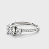 Round-Cut Side Stone Engagement Ring