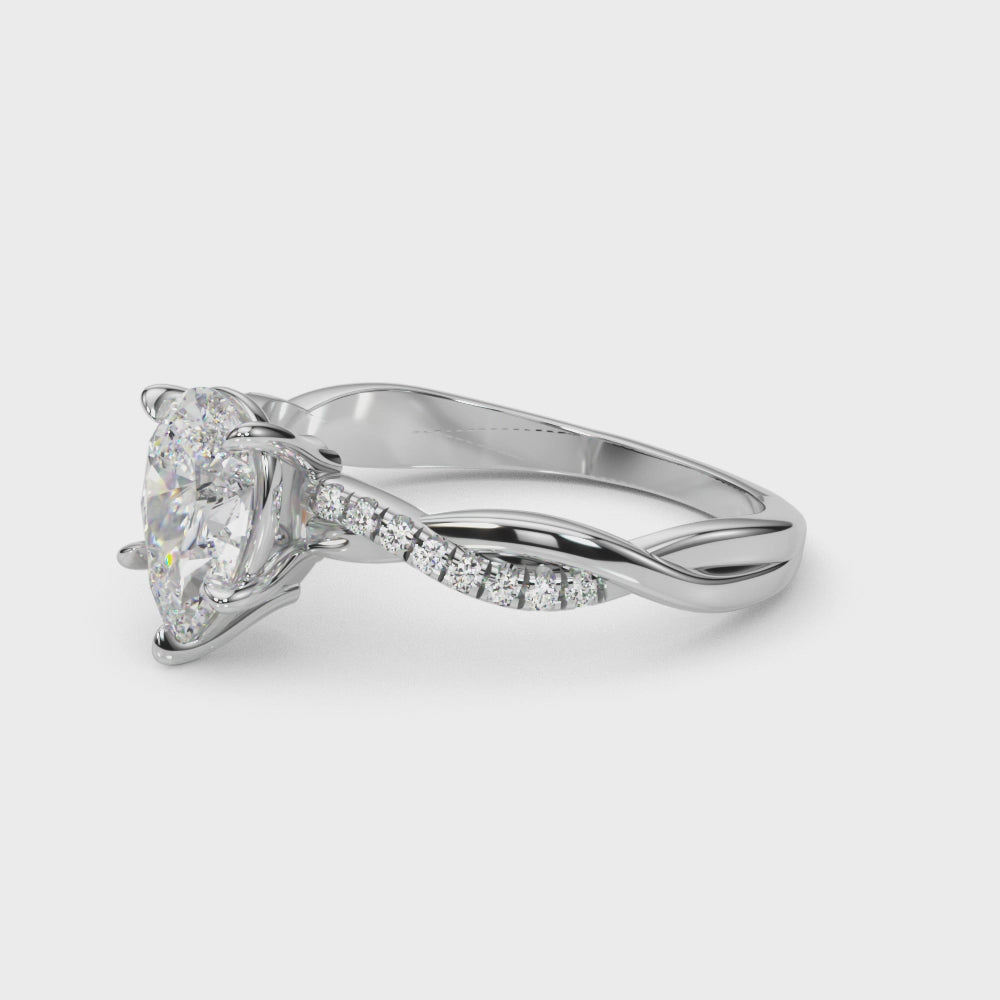 Pear-Cut Side Stone Engagement Ring
