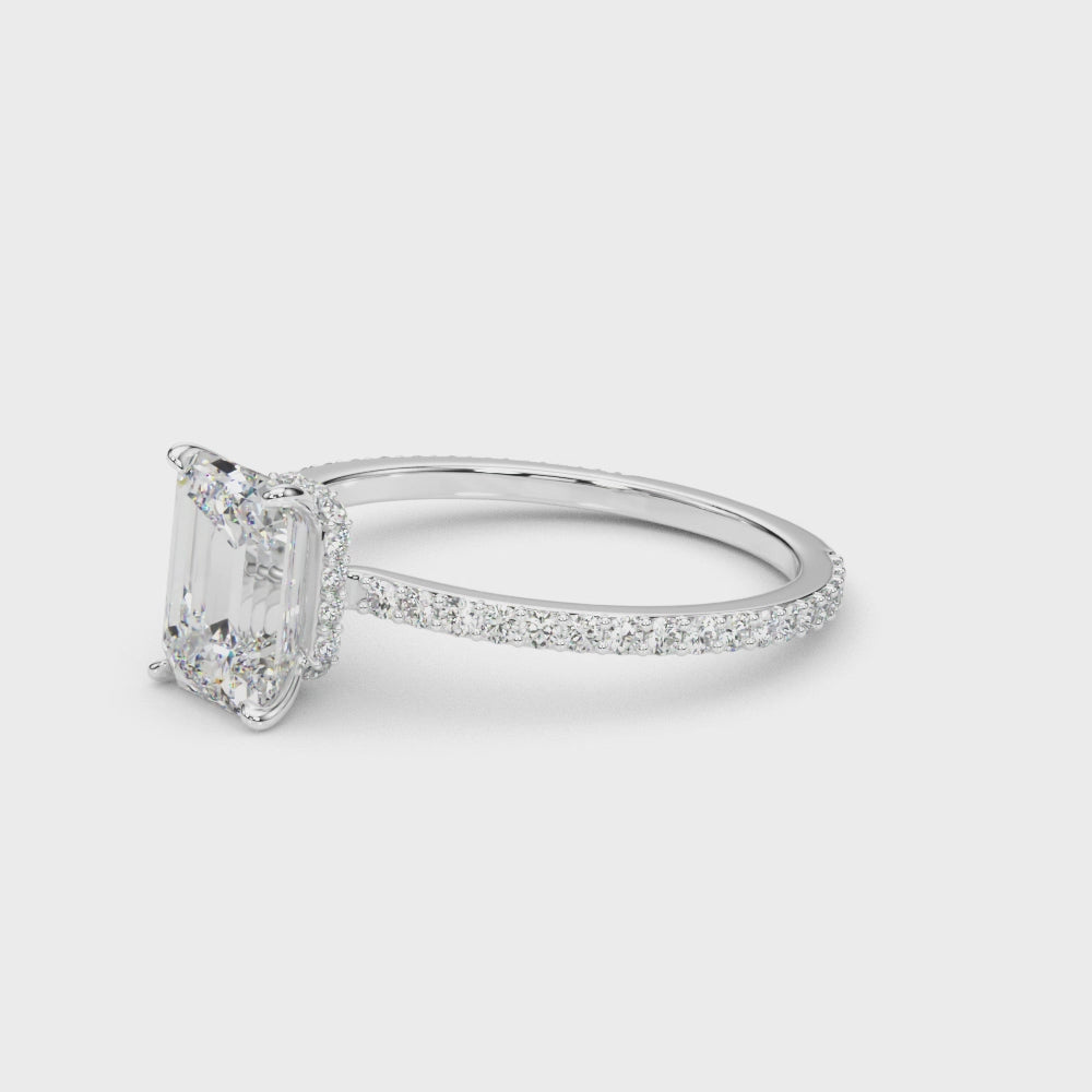Emerald Hidden Halo Side Stone Engagement Ring