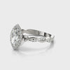 Marquise-Cut Twist Halo Engagement Ring